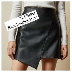 NWT Ted Baker faux leather skirt features an eye-catching asymmetric design